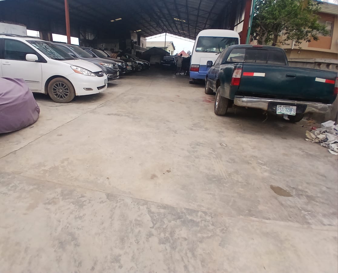 Professional workshop interior with fleet vehicles